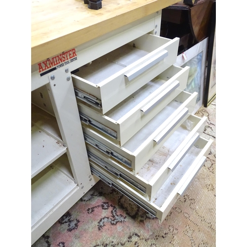 651 - Workshop Tools : An Axminster workbench, the metal base with two shelves and five drawers, approx 54... 