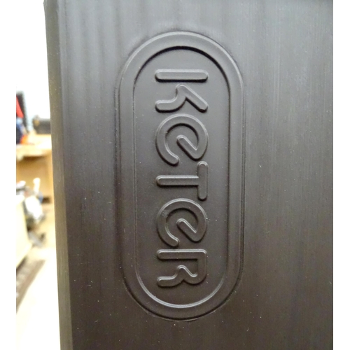 666 - A Keter outdoor storage box, disassembled, the largest section approx 57