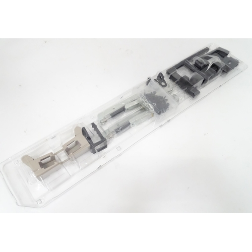 666 - A Keter outdoor storage box, disassembled, the largest section approx 57