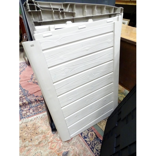 666 - A Keter outdoor storage box, disassembled, the largest section approx 57