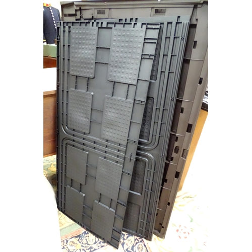 666 - A Keter outdoor storage box, disassembled, the largest section approx 57