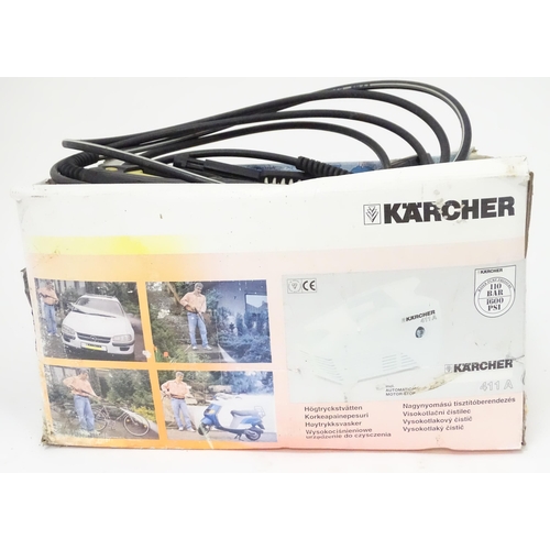 670 - A boxed Karcher 411A pressure washer, approx 16