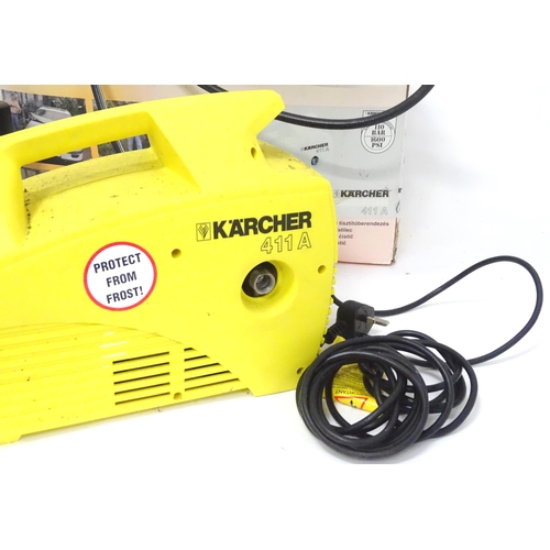 670 - A boxed Karcher 411A pressure washer, approx 16