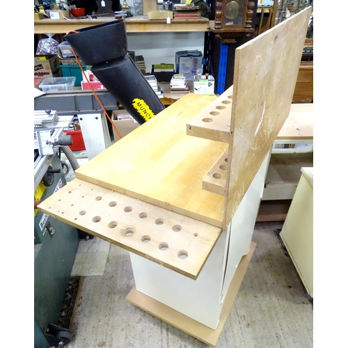 671 - Workshop Tools : an Axminster single workbench, the metal base with locking cupooard and two shelves... 