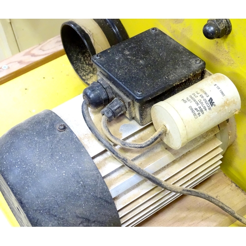 676 - Workshop Tools : a Perform 170mm bandsaw, with cupboard base containing accessories, spare blades et... 