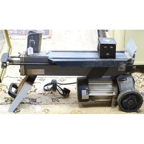 677 - Workshop Tools : a Woodstar lh45 pneumatic log splitting press, on wheeled base, with manual,  appro... 