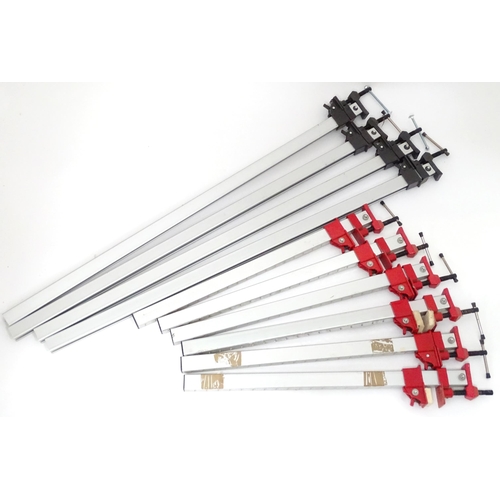 680 - Workshop Tools : A quantity of sash clamps, comprising twelve aluminium and seven steel examples. Th... 