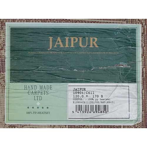 700 - Carpet / Rug : A cream ground rug with floral and acanthus detail within red ground borders. Approx ... 