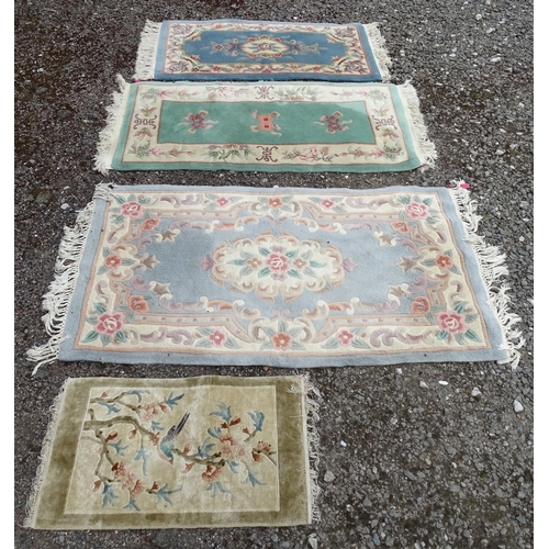 703 - Carpet / Rug : Four various rugs. The largest approx 62