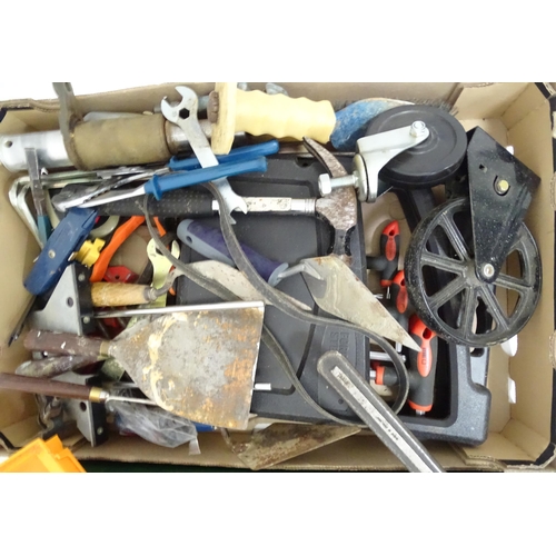 745 - A quantity of hand tools, to include wrench, wheels, vice, hammer etc