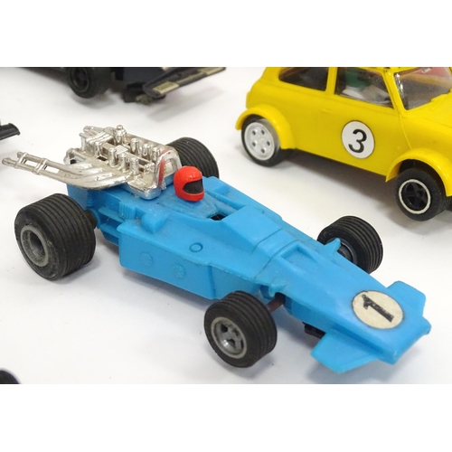 803 - Toys: a quantity of mid 20thC and later Scalextric , to include approx 30 cars, boxed first aid stat... 