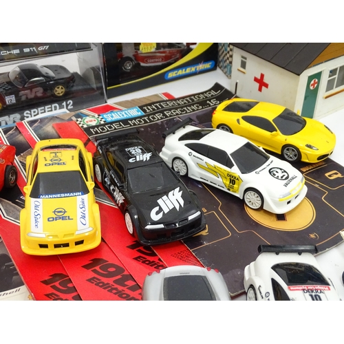 803 - Toys: a quantity of mid 20thC and later Scalextric , to include approx 30 cars, boxed first aid stat... 