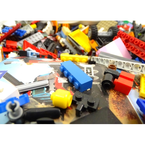 880 - A quantity of Lego to include bricks, wheels and figures etc.