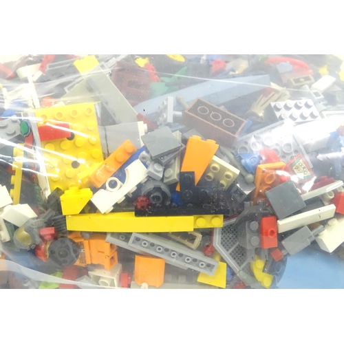 880 - A quantity of Lego to include bricks, wheels and figures etc.