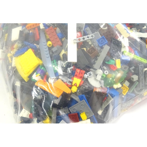 880 - A quantity of Lego to include bricks, wheels and figures etc.