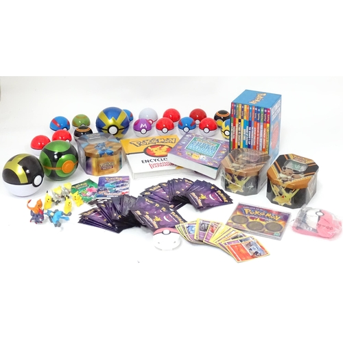 626 - A quantity of assorted Pokemon toys / collectables, to include cards, story books , handbook, encycl... 