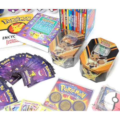 626 - A quantity of assorted Pokemon toys / collectables, to include cards, story books , handbook, encycl... 