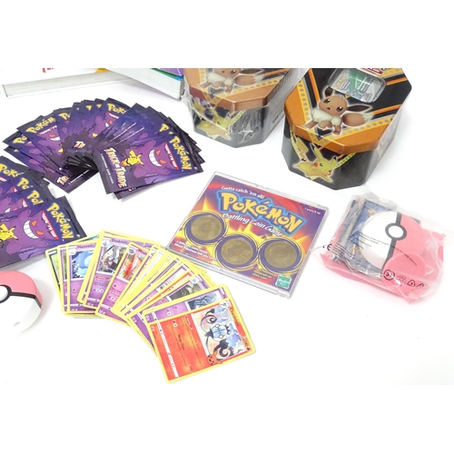 626 - A quantity of assorted Pokemon toys / collectables, to include cards, story books , handbook, encycl... 