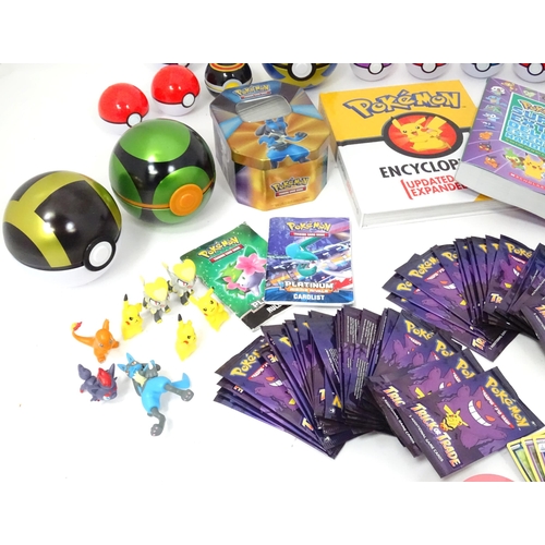 626 - A quantity of assorted Pokemon toys / collectables, to include cards, story books , handbook, encycl... 