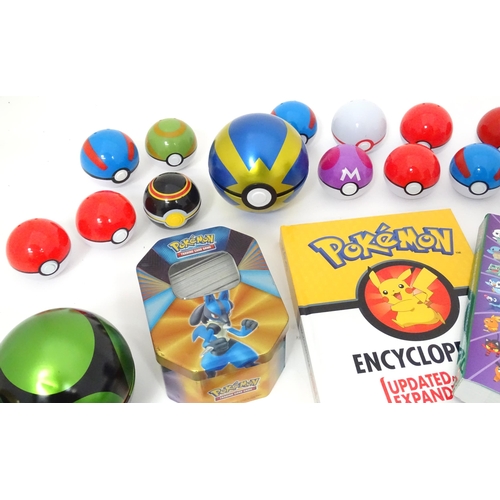 626 - A quantity of assorted Pokemon toys / collectables, to include cards, story books , handbook, encycl... 
