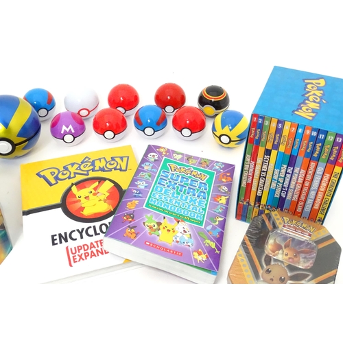 626 - A quantity of assorted Pokemon toys / collectables, to include cards, story books , handbook, encycl... 