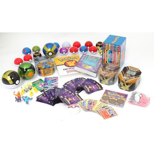 626 - A quantity of assorted Pokemon toys / collectables, to include cards, story books , handbook, encycl... 