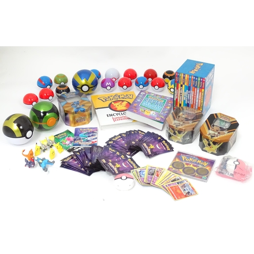 626 - A quantity of assorted Pokemon toys / collectables, to include cards, story books , handbook, encycl... 