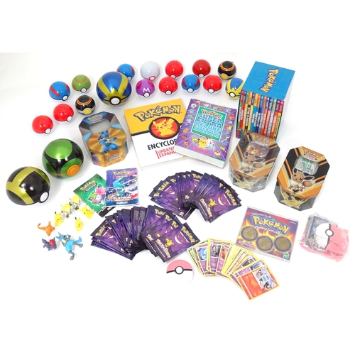 626 - A quantity of assorted Pokemon toys / collectables, to include cards, story books , handbook, encycl... 