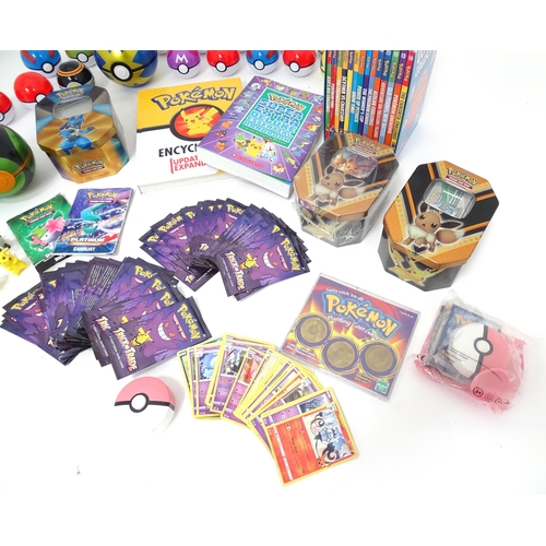 626 - A quantity of assorted Pokemon toys / collectables, to include cards, story books , handbook, encycl... 