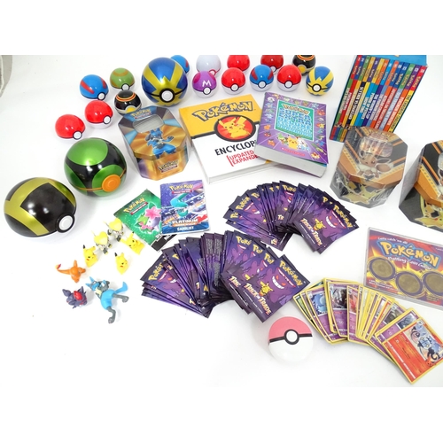 626 - A quantity of assorted Pokemon toys / collectables, to include cards, story books , handbook, encycl... 