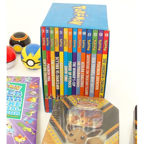 626 - A quantity of assorted Pokemon toys / collectables, to include cards, story books , handbook, encycl... 