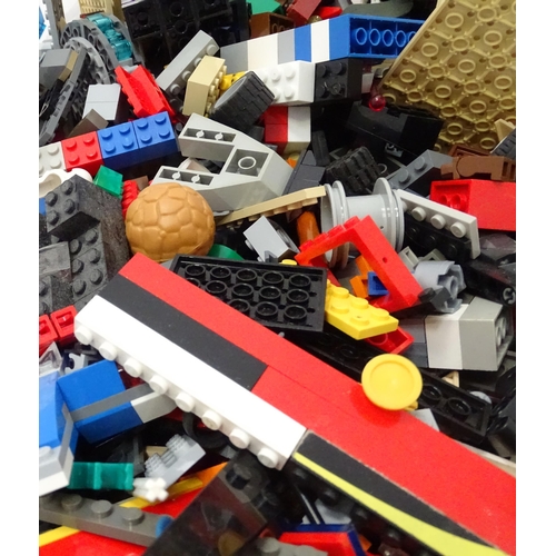629 - A quantity of Lego to include bricks, wheels and figures etc.