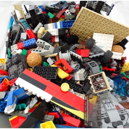 629 - A quantity of Lego to include bricks, wheels and figures etc.