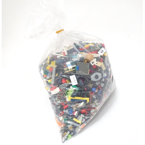629 - A quantity of Lego to include bricks, wheels and figures etc.