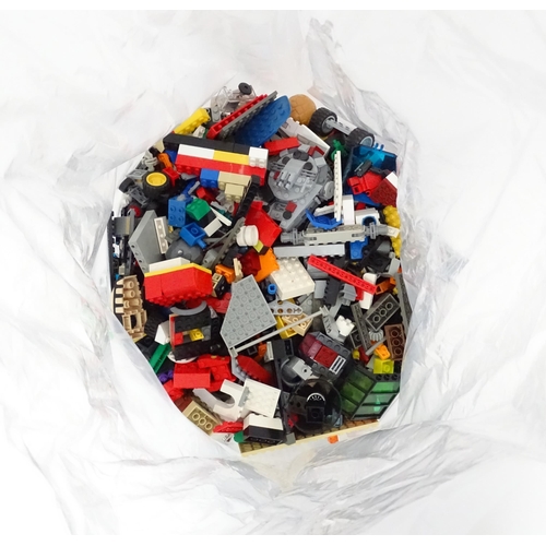 629 - A quantity of Lego to include bricks, wheels and figures etc.
