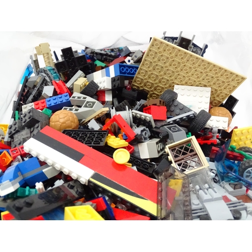 629 - A quantity of Lego to include bricks, wheels and figures etc.