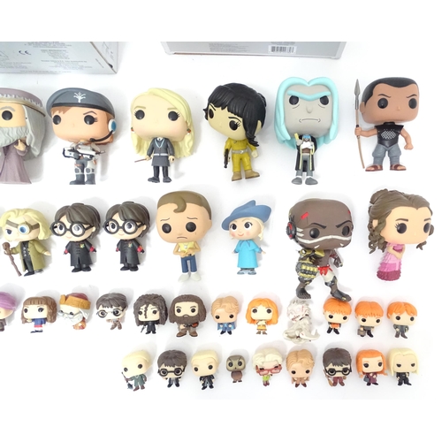 654 - Collectors toys : A quantity of Funko POP! toys to include a boxed Baymax, a boxed Black Panther vs ... 