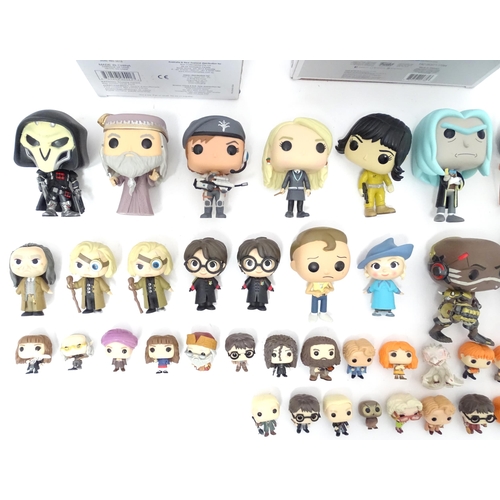 654 - Collectors toys : A quantity of Funko POP! toys to include a boxed Baymax, a boxed Black Panther vs ... 