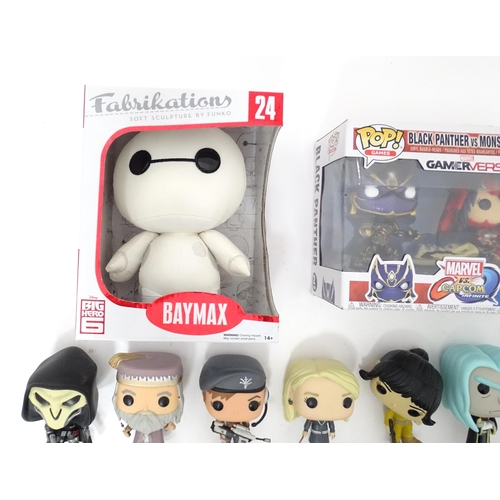 654 - Collectors toys : A quantity of Funko POP! toys to include a boxed Baymax, a boxed Black Panther vs ... 