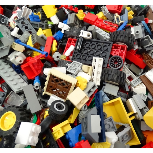 674 - Toys: A quantity of Lego to include bricks, wheels and figures etc.