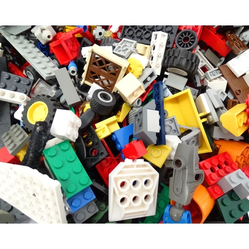 674 - Toys: A quantity of Lego to include bricks, wheels and figures etc.
