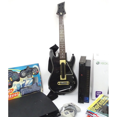 681 - Toys: A quantity of assorted video game consoles and accessories to include an XBOX 360, PlayStation... 