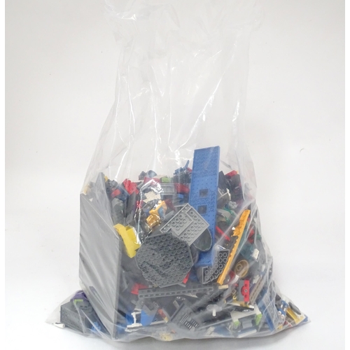 694 - A quantity of Lego to include bricks, wheels and figures etc.