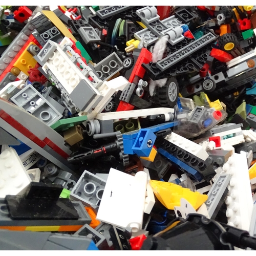 694 - A quantity of Lego to include bricks, wheels and figures etc.