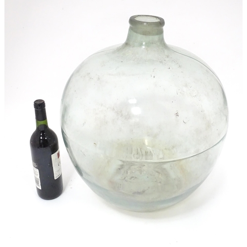 80 - A large glass carboy / demijohn bottle, approx 20