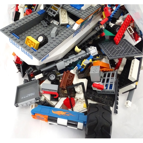 835 - Toys: A quantity of Lego to include bricks, wheels and figures etc.