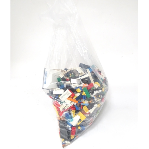 835 - Toys: A quantity of Lego to include bricks, wheels and figures etc.