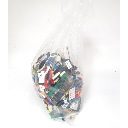835 - Toys: A quantity of Lego to include bricks, wheels and figures etc.