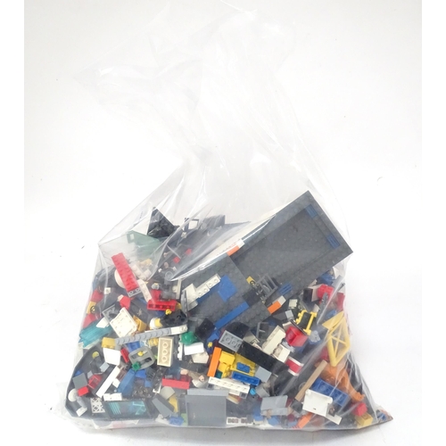 835 - Toys: A quantity of Lego to include bricks, wheels and figures etc.