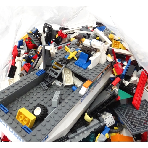 835 - Toys: A quantity of Lego to include bricks, wheels and figures etc.